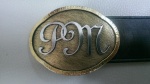 Gürtelschnalle Monogramm